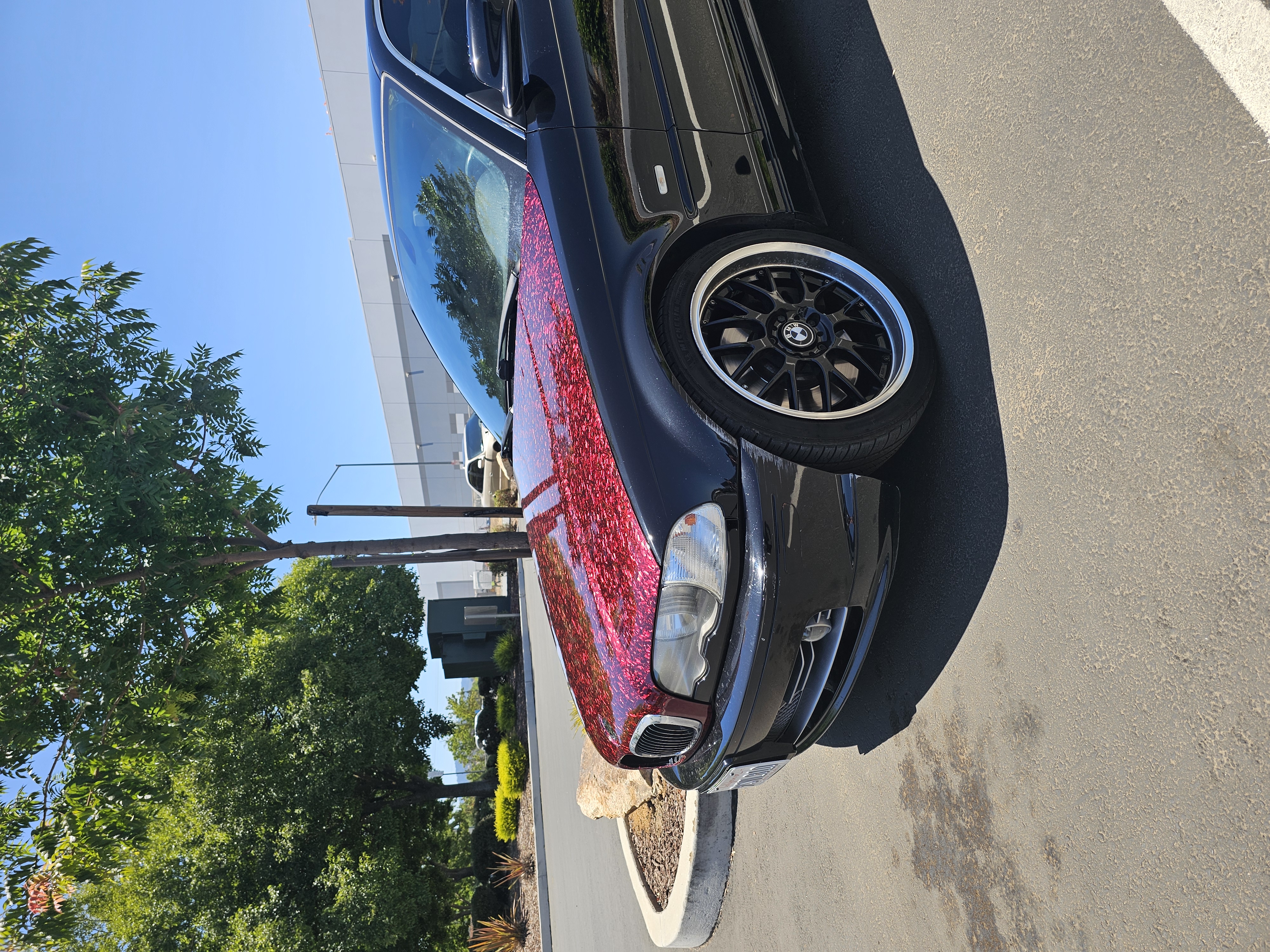 BMW 330Ci with a red forged carbon PPF hood